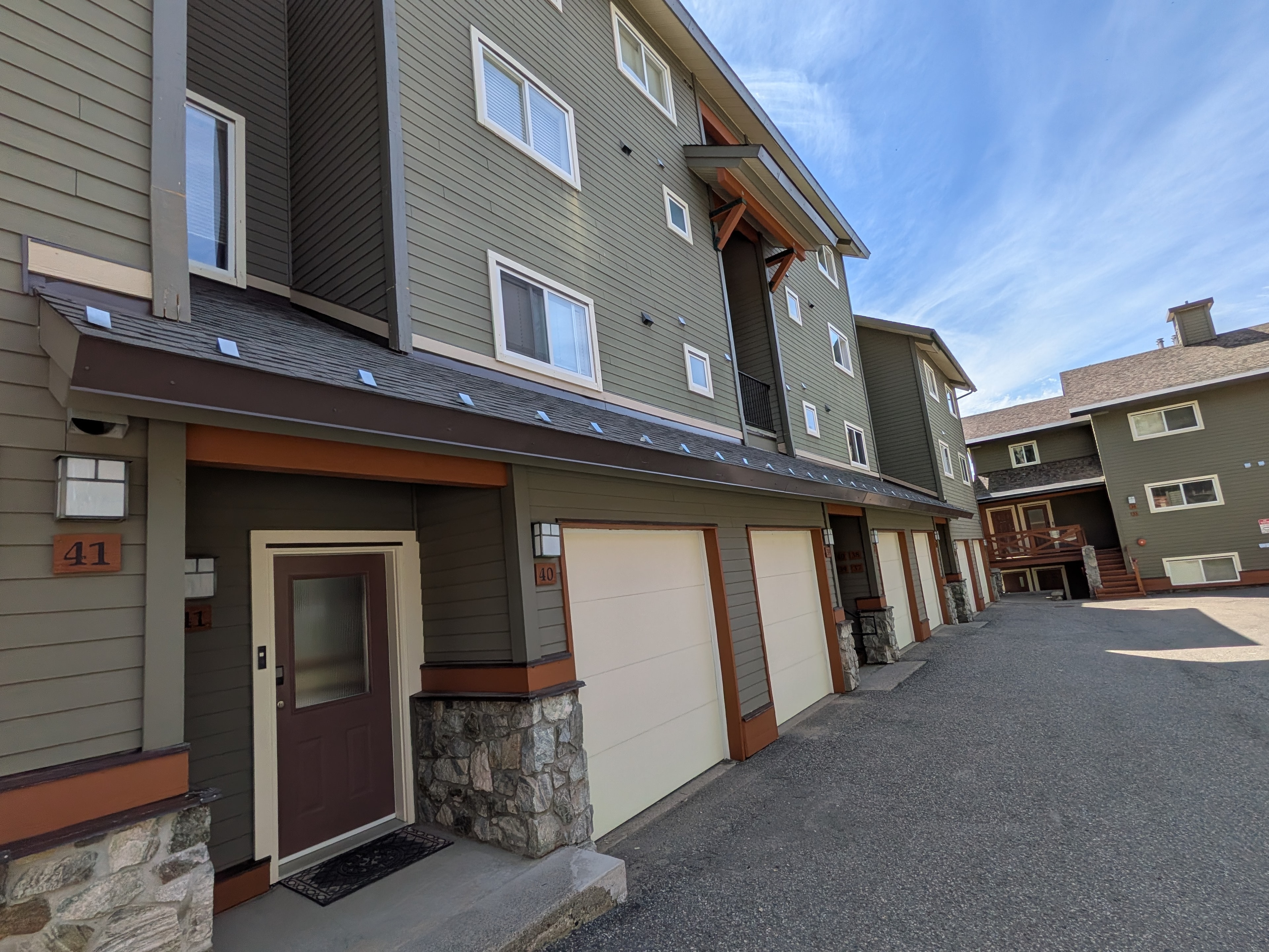 Completed roofing on multi-unit townhome complex at Big White