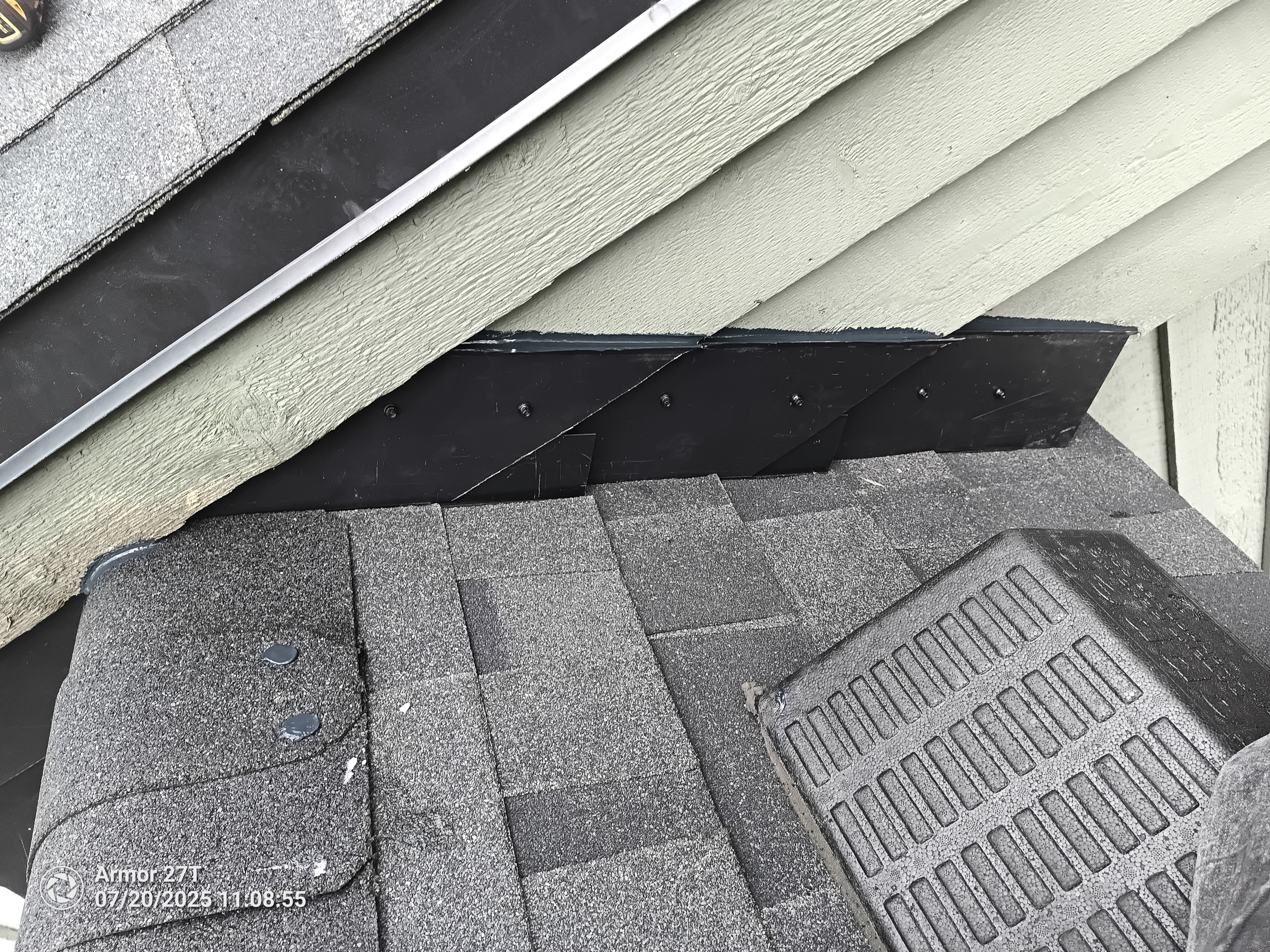 Roof flashing and step flashing repair detail on residential home